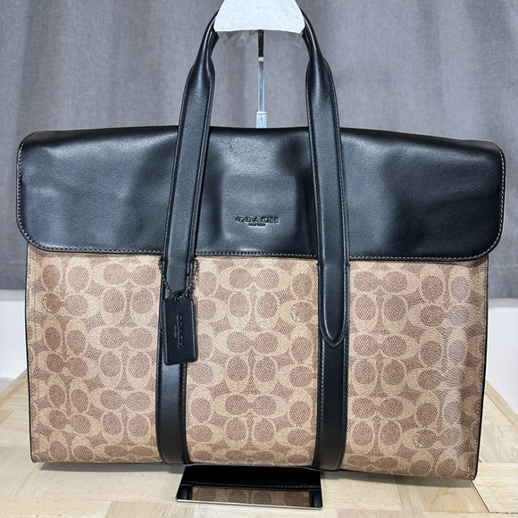 Coach Handbags - Coach portfolio in tan signature coated canvas and black leather